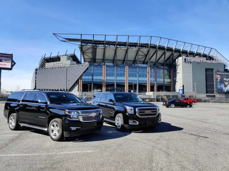 Two black SUVs outside Lincoln Financial Field in Philadelphia